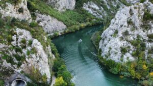 The emerald Cetina river cutting through a white karst canyon near Sinj, inland Dalmatia