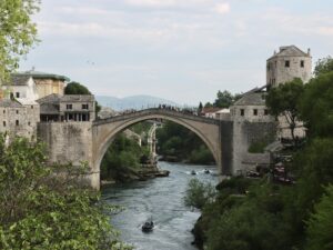 Stari Most, Mostar — the rebuilt Ottoman stone arch over the turquoise Neretva river