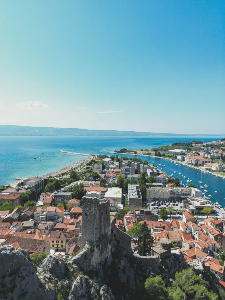 View from Mirabela fortress over Omiš old town and the Cetina river mouth meeting the Adriatic near Split